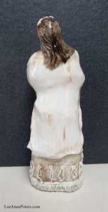 Sculpture - Lady holding a baby