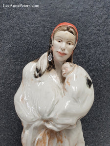 Sculpture - Lady holding a baby